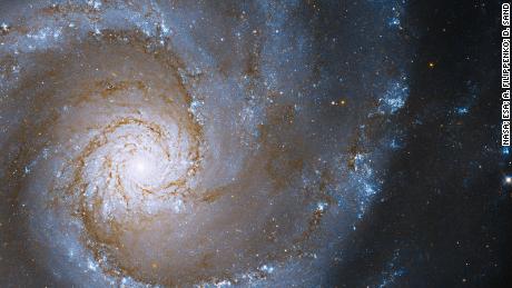 This image from NASA&#39;s Hubble Space Telescope features the Grand Design Spiral, NGC 3631, located some 53 million light-years away in the direction of the constellation Ursa Major. The &quot;arms&quot; of grand design spirals appear to wind around and into the galaxy&#39;s nucleus.