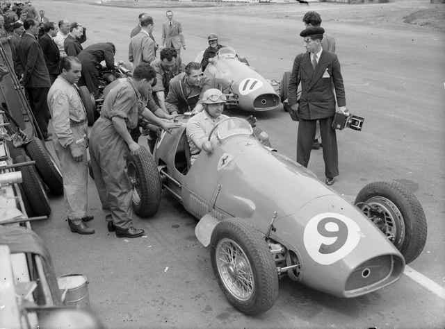 <p>Jose Froilan Gonzalez in a Ferrari F1 car at Silverstone circuit in 1954 </p>