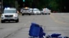 Empty chairs are seen on the street after a mass shooting at the Highland Park Fourth of July parade in downtown Highland Park, Ill., a Chicago suburb on Monday, July 4, 2022.