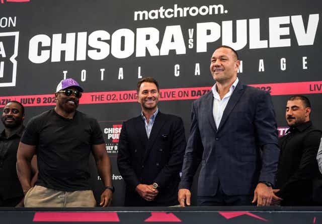 <p>Derek Chisora (centre-left) and opponent Kubrat Pulev (centre-right) (Victoria Jones/PA)</p>