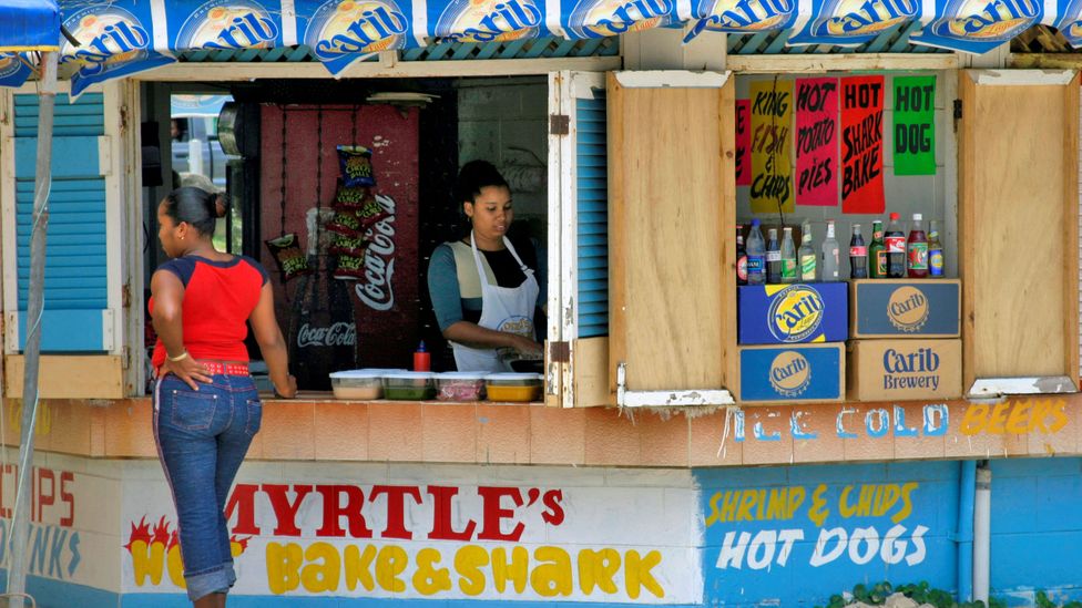 Beach shacks serving locals specialties can be found all over Trinidad & Tobago (Credit: RGB Ventures/Alamy)