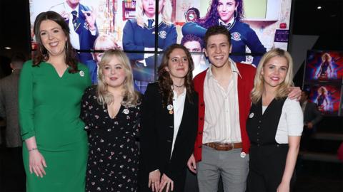 Lisa McGee (left) with members of the Derry Girls cast