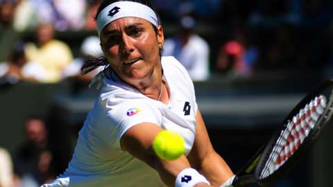 Ons Jabeur in action against Tatjana Maria in her Wimbledon semi-final