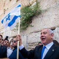 Head of the Likud party Benjamin Netanyahu at the Western Wall in Jerusalem's Old City, on Jerusalem Day, May 29, 2022. (Arie Leib Abrams/Flash90)