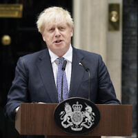 Prime Minister Boris Johnson reads a resignation statement outside 10 Downing Street, London, July 7, 2022. (AP Photo/Alberto Pezzali)