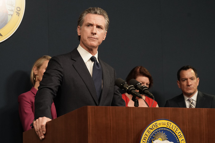 California Gov. Gavin Newsom pauses as he discusses the Supreme Court's decision to overturn Roe v. Wade during a news conference.
