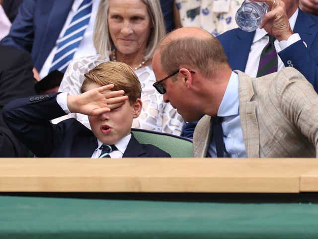 <p>Prince William, Duke of Cambridge (R) and Prince George of Cambridge interact in the Royal Box watching Novak Djokovic of Serbia play Nick Kyrgios of Australia during their Men's Singles Final match</p>