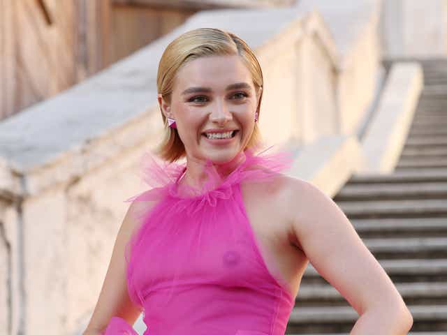 <p>Florence Pugh attended the show wearing a pink tulle gown</p>