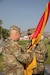 Col. Shawn M. Fuellenbach, the incoming commander of the 65th Field Artillery Brigade passes the organizational colors to Maj. Gen. Michael Turley, the adjutant general, Utah National Guard, during a change-of-command ceremony Aug. 8, 2021, at Camp Williams, Utah. Fuellenbach took command of the 65th FAB from Col. Steven Fairbourn during the ceremony. (U.S. Army photo by Sgt. Rebecca Call)