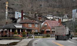 A coal truck rounds a corner near a dormant coal operation in March 2019 in Keystone, West, Virginia. 