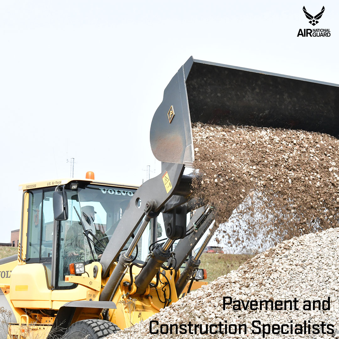 Pavement and Construction Personnel conduct heavy equipment on a base ground. 
