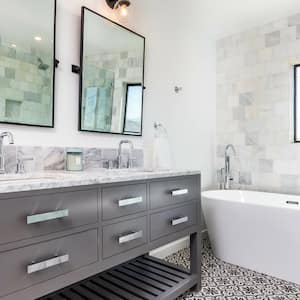 Tiled floors and wall in bathroom