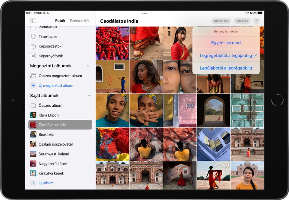 A Fotók oldalsáv meg van nyitva a képernyő bal oldalán. A Saját albumok fejléc alatt az Amazing India című album van kiválasztva. A képernyő fennmaradó része fotóbélyegképeket jelenít meg az albumból egy rácsban. A képernyő jobb felső sarkában a Továbbiak gomb van kiválasztva, és a Rendezés módja lehetőségei jelennek meg: Egyéni sorrend, Legrégebbitől a legújabbig vagy Legújabbtól a legrégebbiig. A Legrégebbitől a legújabbig opció van kiválasztva.