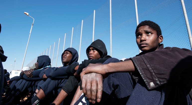 Migrants sit in the courtyard of a detention centre in Libya. (file)