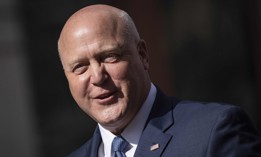  Senior Advisor to the President for Infrastructure Coordination Mitch Landrieu speaks during an event to discuss investments in the U.S. electric vehicle charging network, outside Department of Transportation headquarters in February.