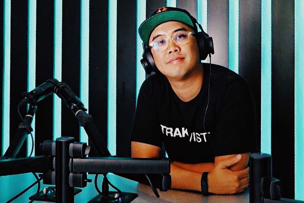 Filipino activist and music advocate activist Richie Menchavez, aka TRAKTIVIST, sits in a recording studio