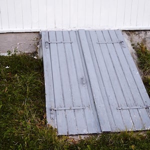 The entrance to a basement storm shelter