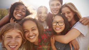 Teenage school friends smiling and having fun