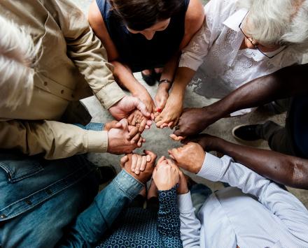 group holding hands