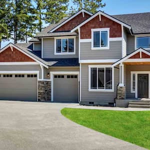 grey and red house on concrete porch