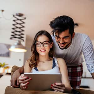 Couple looking at tablet