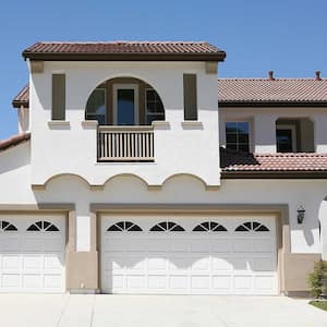 White stucco house with arches