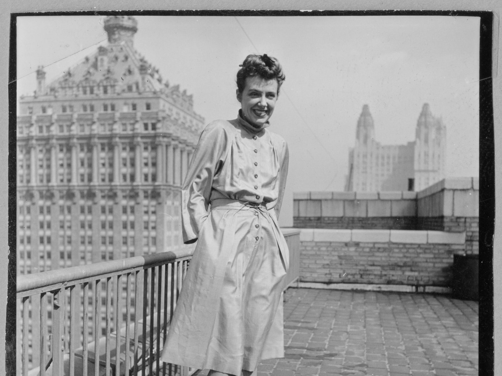 Claire McCardell in one of her own designs on a rooftop.