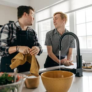 Young couple spending time together in the kitchen