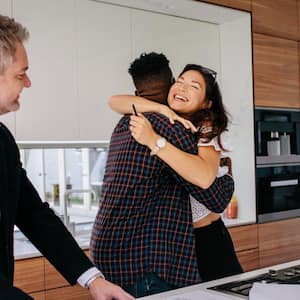 A happy couple buying a new house