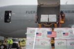 Covax delivery being unloaded from plane (State Department Photo)