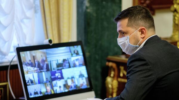Президент Украины Владимир Зеленский во время совещания в режиме онлайн