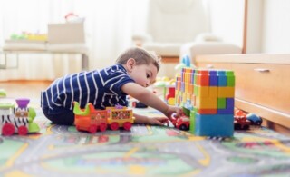 child playing in playroom