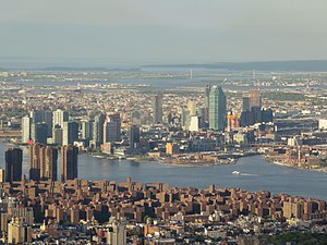 Expanding skyline of Long Island City, Queens, with One Court Square center-right, as seen from across the East River (2017)