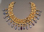 Collier; late 6th–7th century; gold, an emerald, a sapphire, amethysts and pearls; diameter: 23 cm (9.1 in); from a Constantinopolitan workshop; Antikensammlung Berlin (Berlin, Germany)[245]