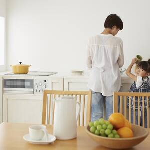 Mother cooking with her daughter 