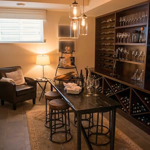 Wine cellar in basement with exposed brick wall