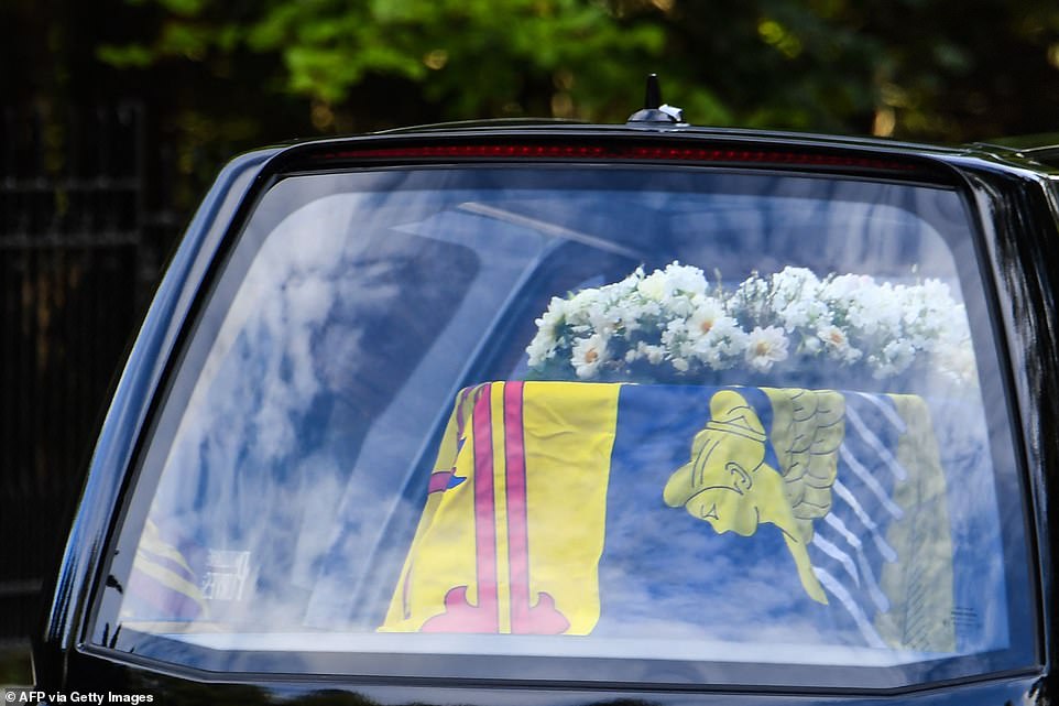 The wreath is made up of flowers from the Balmoral estate including sweet peas - one of the Queen's favourite flowers - dahlias, phlox, white heather and pine fir