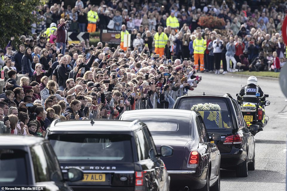 The Queens cortege passing dignitaries at Duthie park in Aberdeen and crossing the George VI bridge over the river Dee for the final time