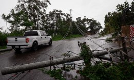 Downed power lines on road PR-743 in Cayey, Puerto Rico as the island awoke to a general power outage on September 19, 2022 in San Juan, Puerto Rico. 