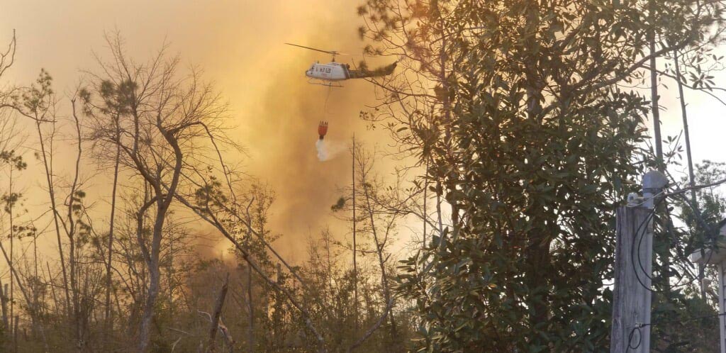 Helicopter drops water Adkins Avenue Fire