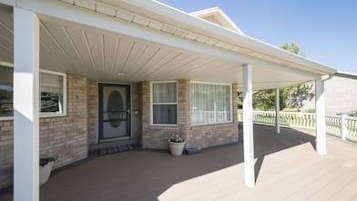  wooden veranda in a house with a screen door