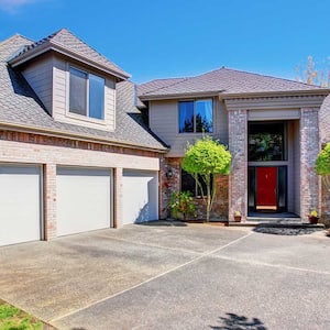 Home with a concrete driveway