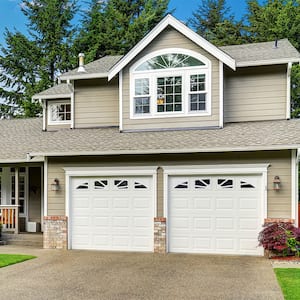 grey house exterior with lawn