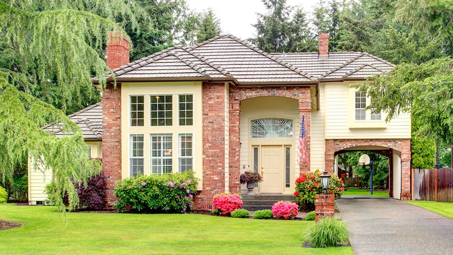 Large suburban home with brick siding