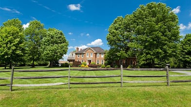 A house with a wood fence