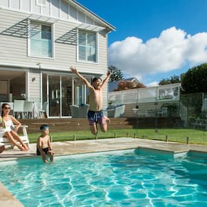 A family having fun in the swimming pool