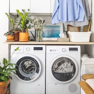 laundry room with washer and dryer machine