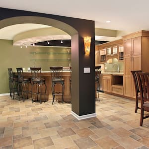 A view of a basement living area with a bar