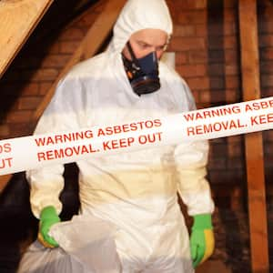 Man removing asbestos