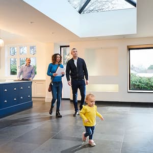 Family looking at house